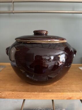 Vintage brown stoneware bean pot with a lid and side handles
